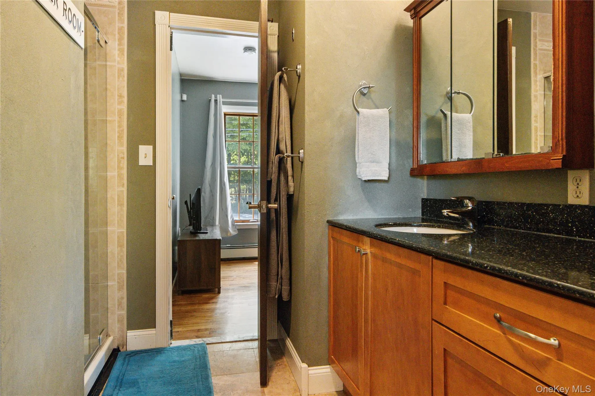 Full bath on first floor with double entry from the family room as well as 1st floor bedroom Full bath on first floor with double entry from the family room as well as 1st floor bedroom