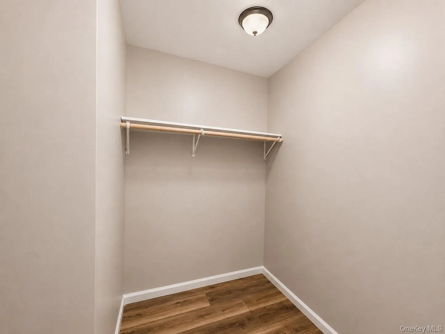Primary Walk-In Closet Primary Walk-In Closet
