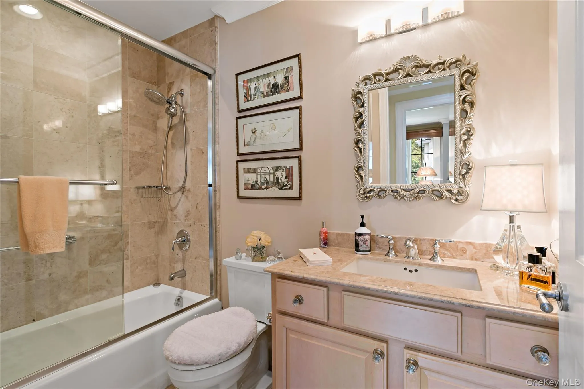 A beautifully finished second full bath for guests. A beautifully finished second full bath for guests.