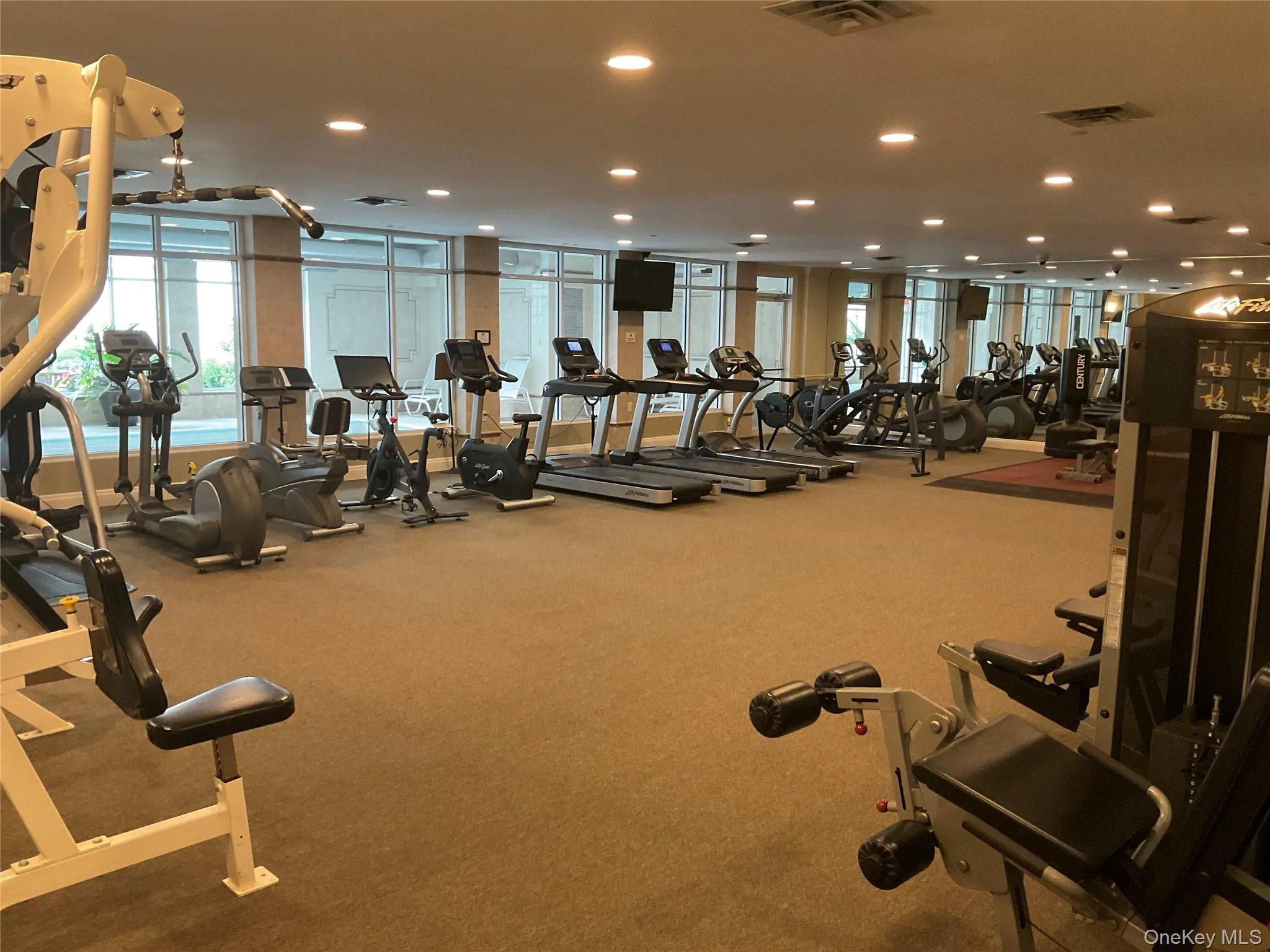 Stay active year-round in the spacious, fully equipped fitness center. Stay active year-round in the spacious, fully equipped fitness center.