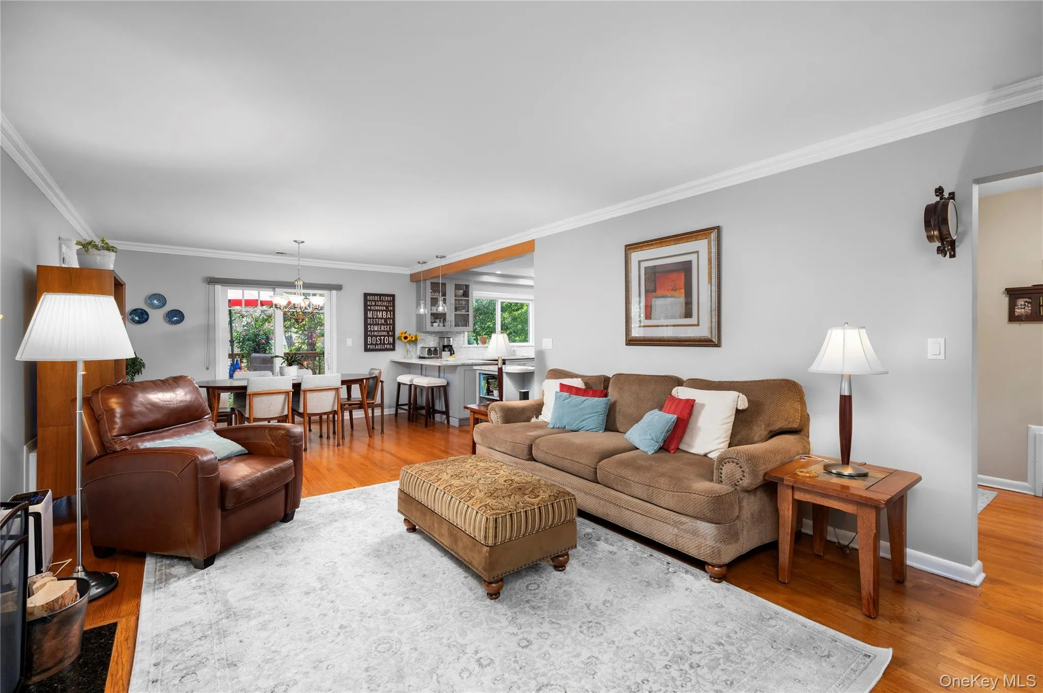 The home flows easily from the entry hall into the living room, dining room, and kitchen, creating a comfortable and connected living space The home flows easily from the entry hall into the living room, dining room, and kitchen, creating a comfortable and connected living space