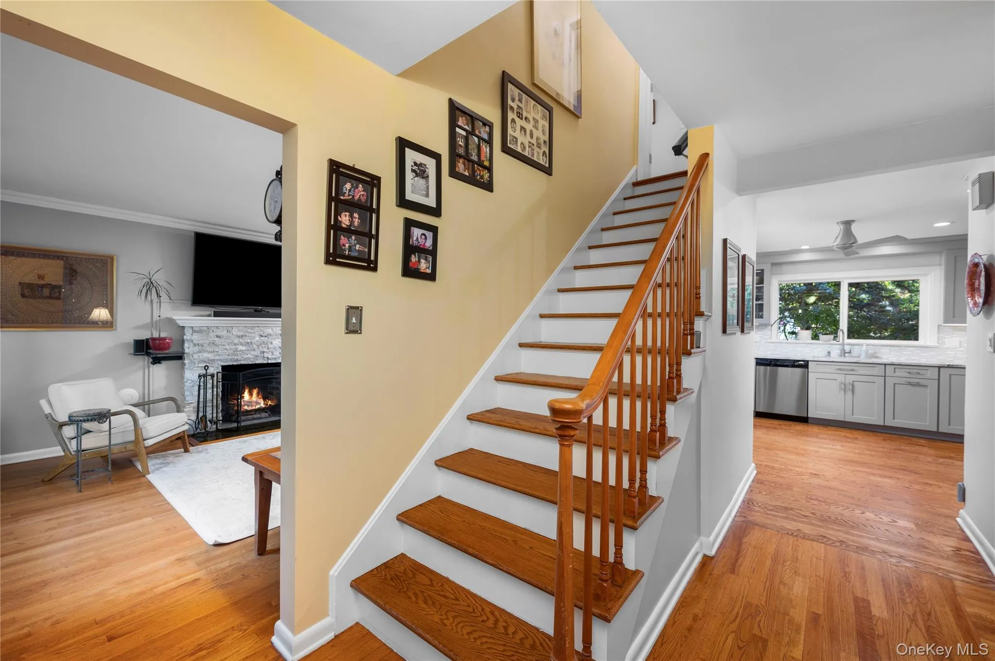 Hardwood flooring, wood staircase leading to the primary bedroom Hardwood flooring, wood staircase leading to the primary bedroom
