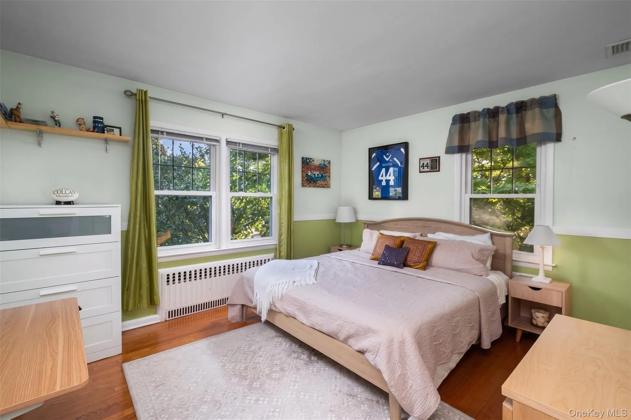 Bedroom #2 is also located on the first floor and features beautiful hardwood floors Bedroom #2 is also located on the first floor and features beautiful hardwood floors