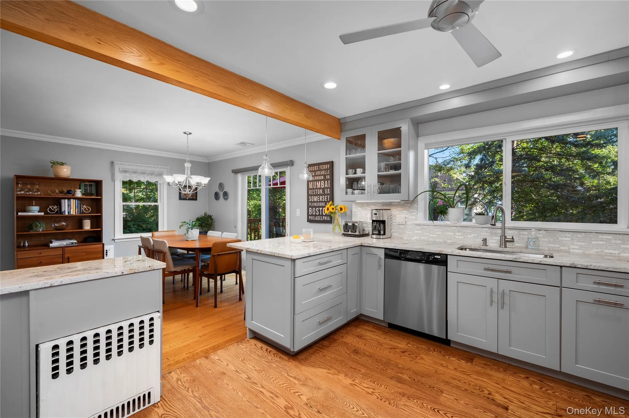Conveniently connected to the dining room, the kitchen offers an easy flow for entertaining, with direct access to the lower level Conveniently connected to the dining room, the kitchen offers an easy flow for entertaining, with direct access to the lower level