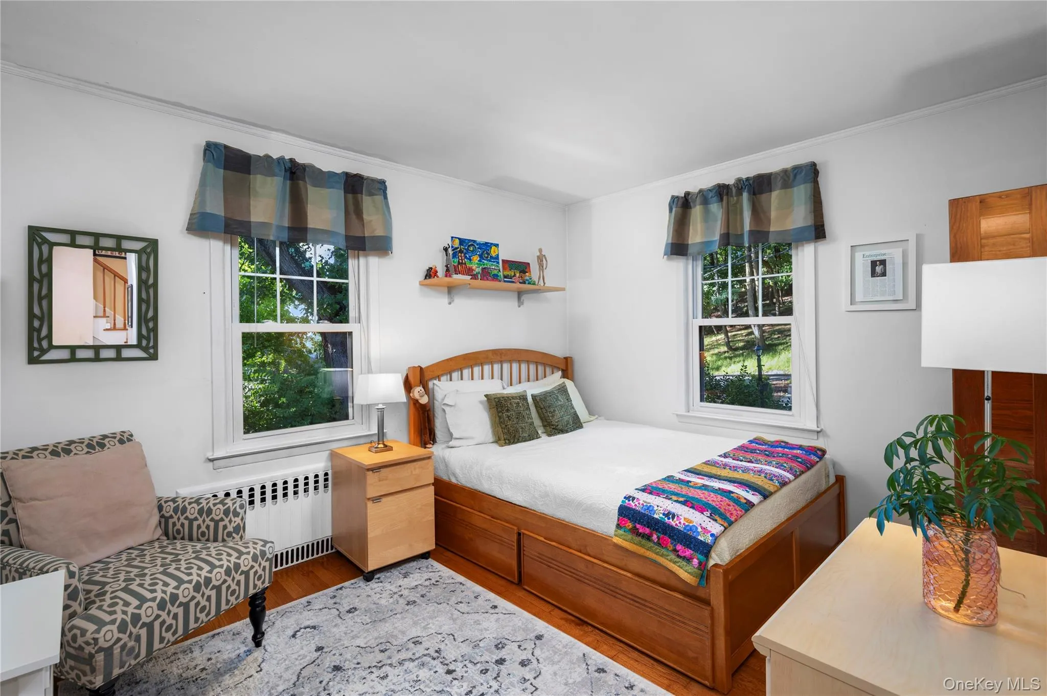 Bedroom #1 is located on the first floor and has windows on two sides for plenty of natural light Bedroom #1 is located on the first floor and has windows on two sides for plenty of natural light