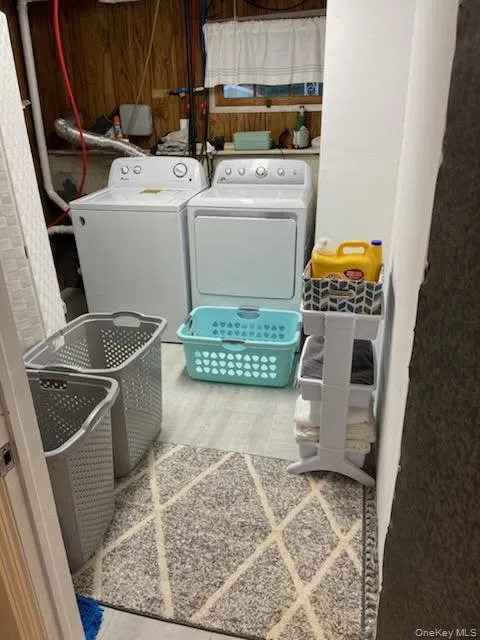 Laundry area featuring independent washer and dryer Laundry area featuring independent washer and dryer