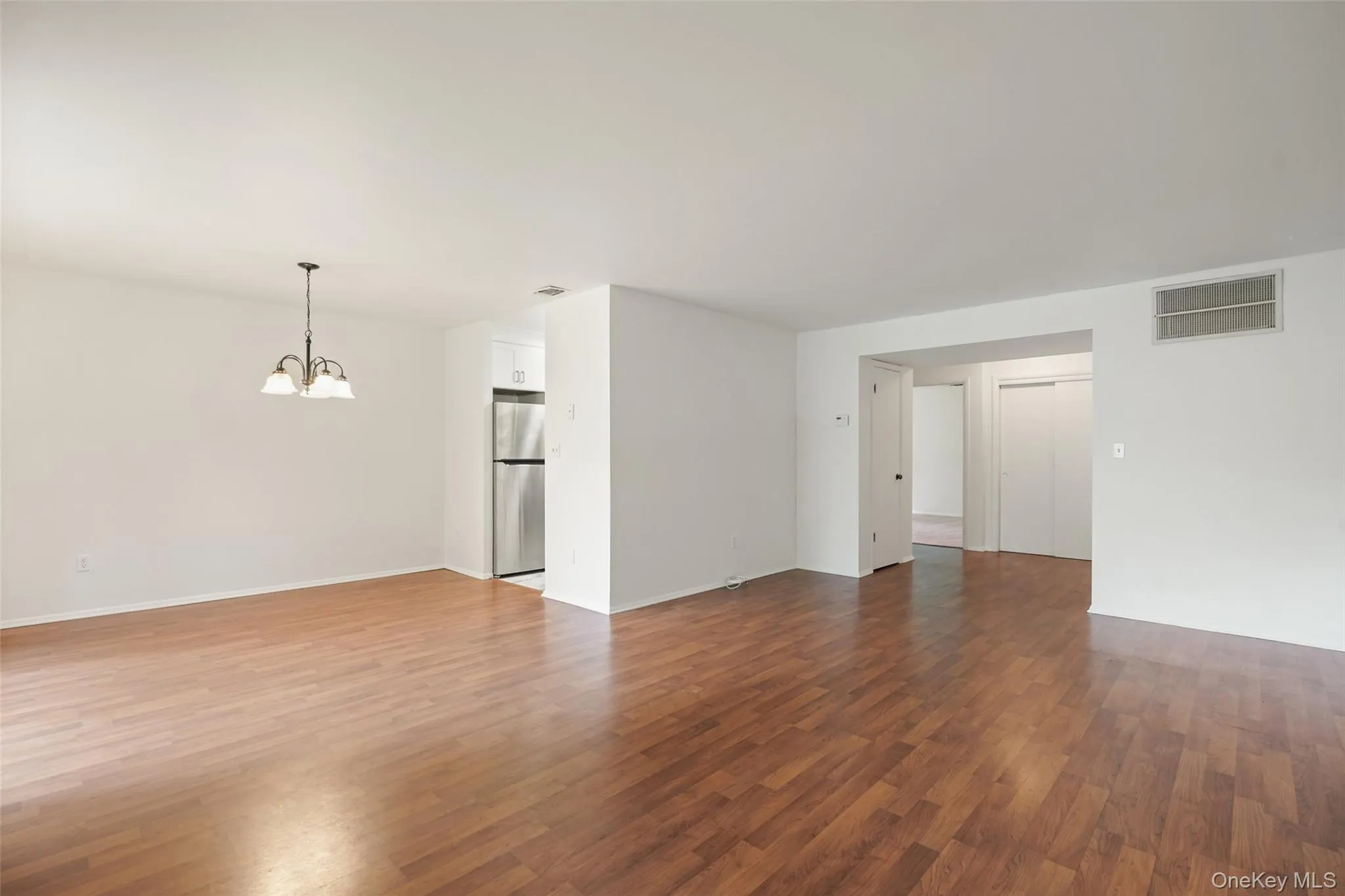 Living Room and Dining Area with Modern flooring Living Room and Dining Area with Modern flooring