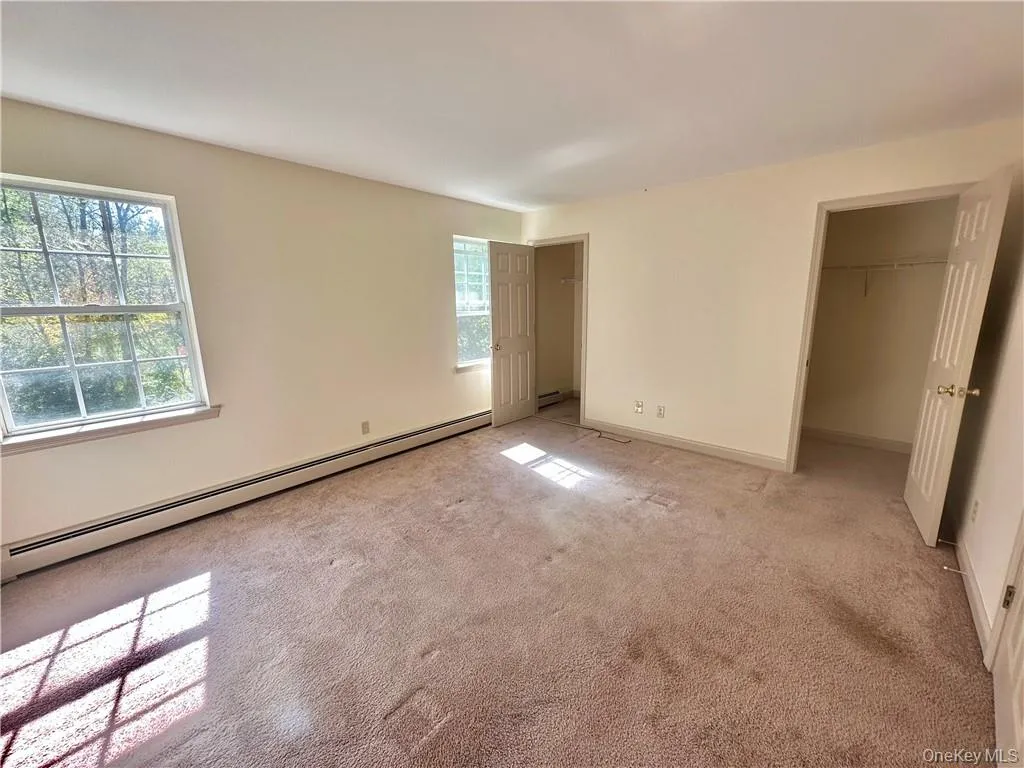 Primary bedroom with two large walk in closets. Primary bedroom with two large walk in closets.