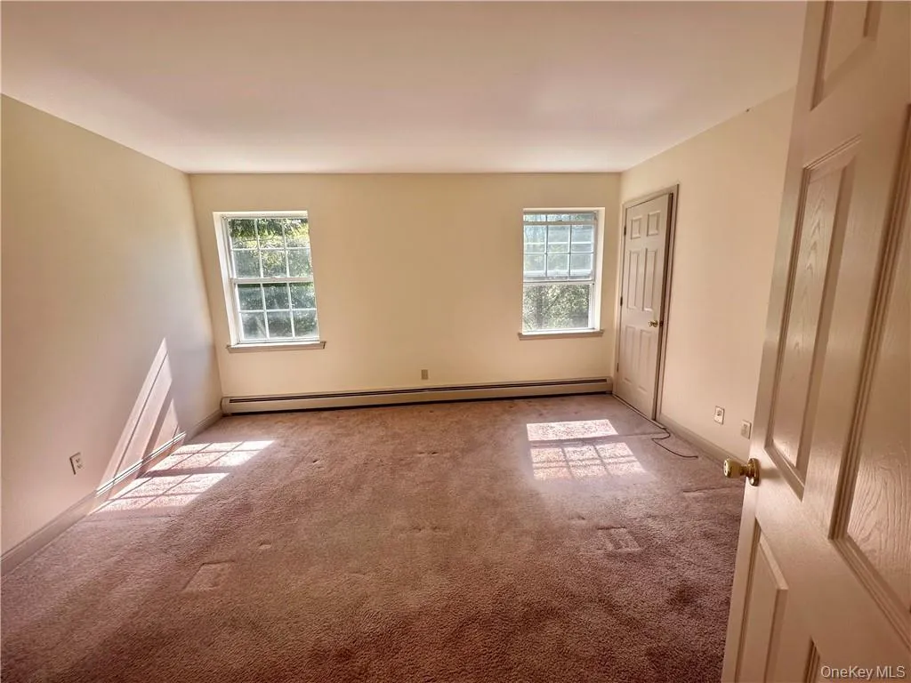 Primary bedroom with lots of natural light. Primary bedroom with lots of natural light.