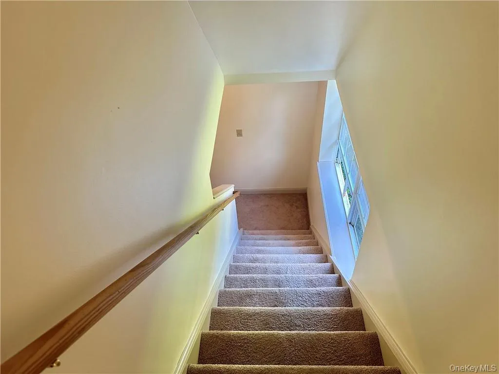Stairs leading to lower level. Stairs leading to lower level.