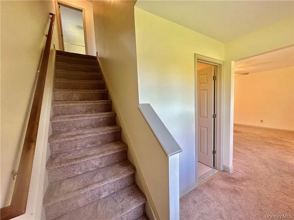 Stairs leading to second level. Stairs leading to second level.