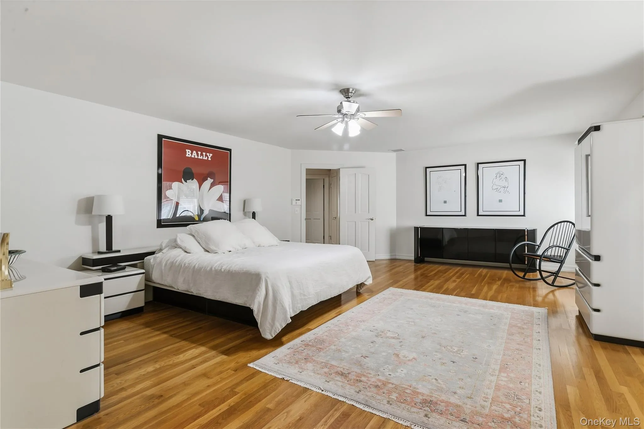 Expansive Primary bedroom offers hardwood floors and ceiling fan. Expansive Primary bedroom offers hardwood floors and ceiling fan.
