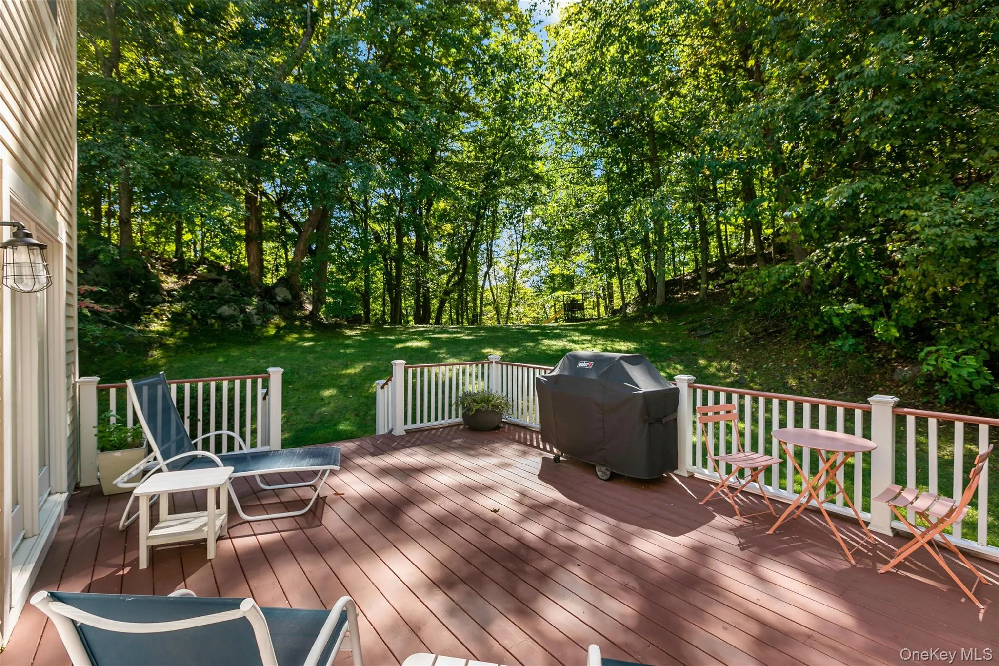 Back yard deck overlooking private yard. Back yard deck overlooking private yard.