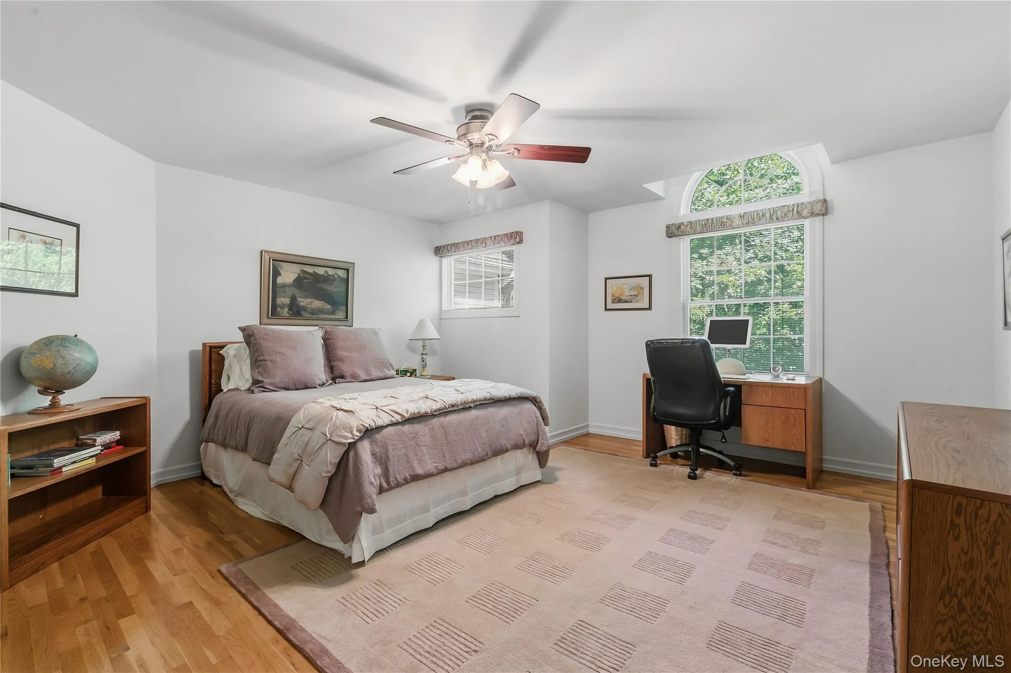 Family bedroom offers a double closet, ceiling fan, hardwood floor. Family bedroom offers a double closet, ceiling fan, hardwood floor.