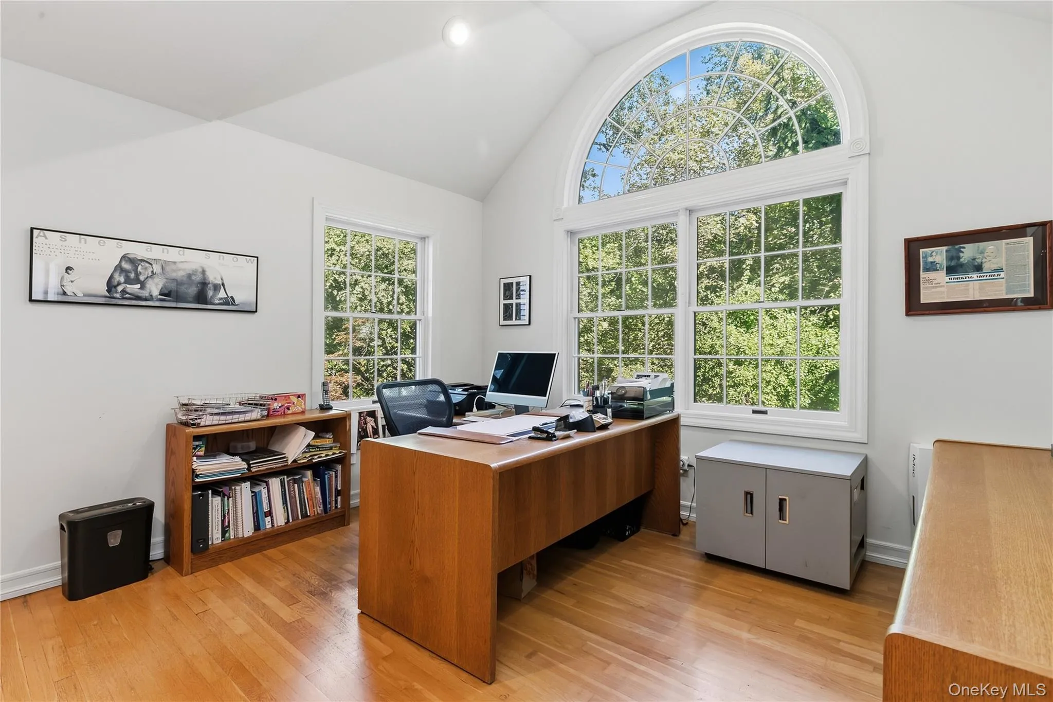 The loft/library offers a cathedral ceiling, Palladian window located atop the front staircase. The loft/library offers a cathedral ceiling, Palladian window located atop the front staircase.