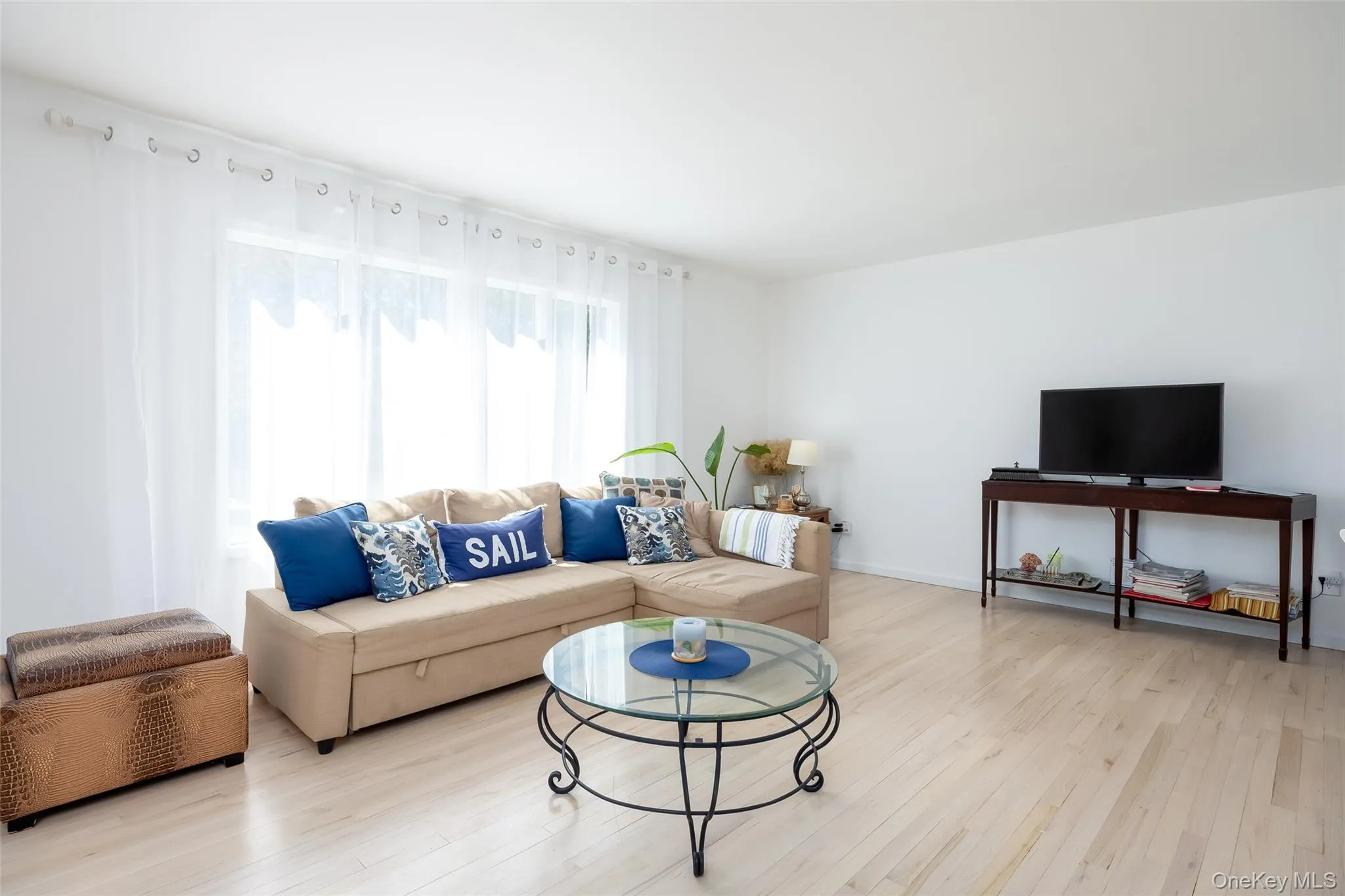 Living room featuring light wood finished floors Living room featuring light wood finished floors