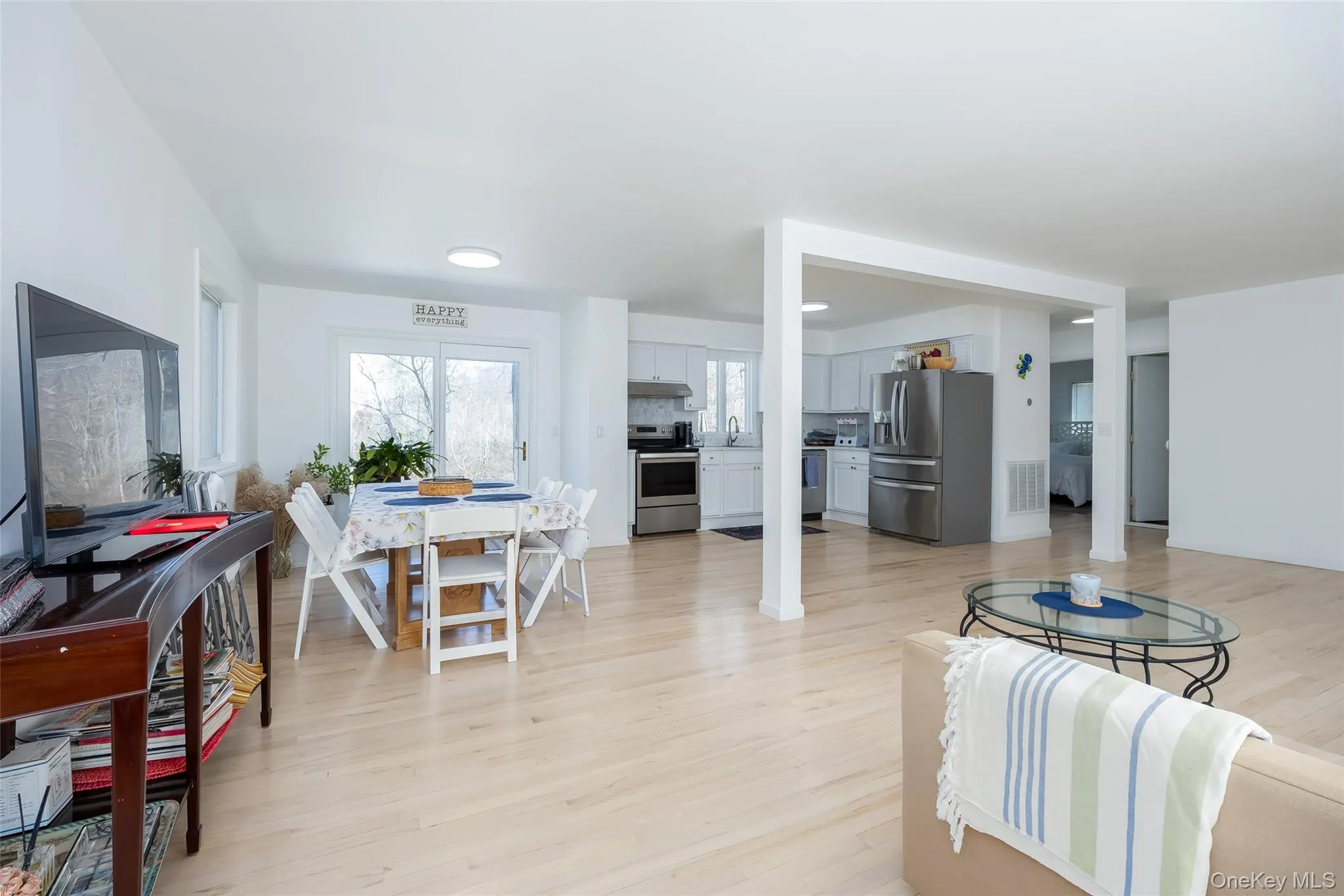 Living area featuring light wood finished floors Living area featuring light wood finished floors