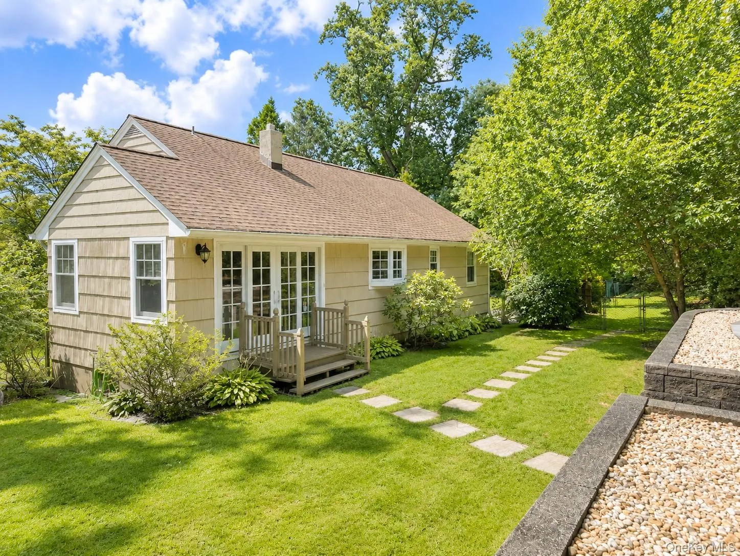 Back of Structure with access to Pool and Expansive 1.24 acre lot - Virtually Enhanced Back of Structure with access to Pool and Expansive 1.24 acre lot - Virtually Enhanced