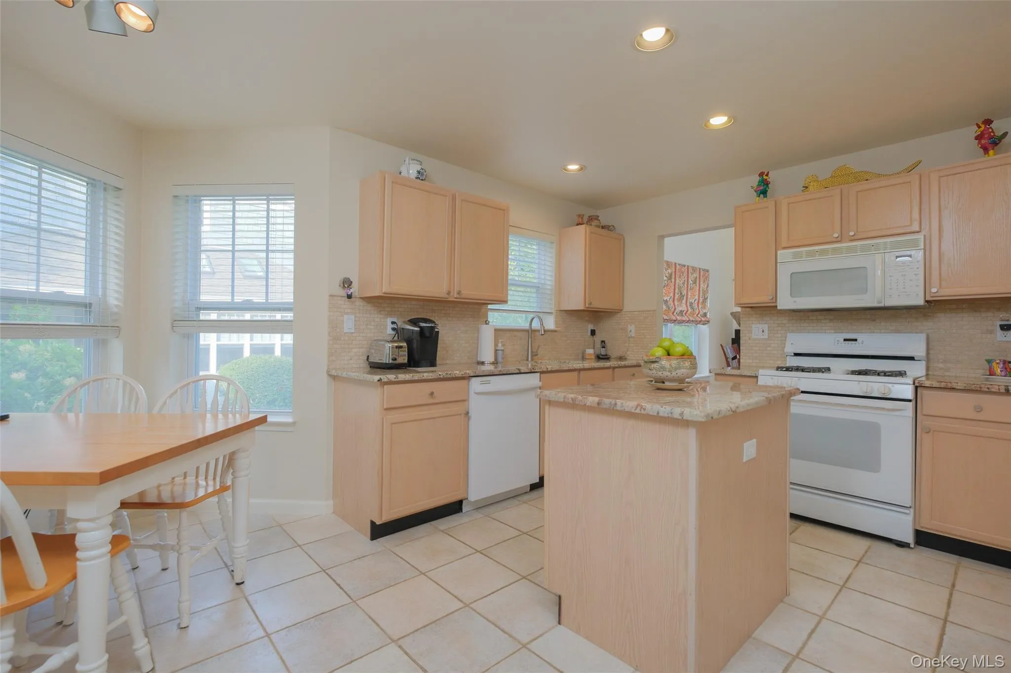 The eat-in kitchen filled with light and everything you need to make cooking and entertaining a breeze! The eat-in kitchen filled with light and everything you need to make cooking and entertaining a breeze!