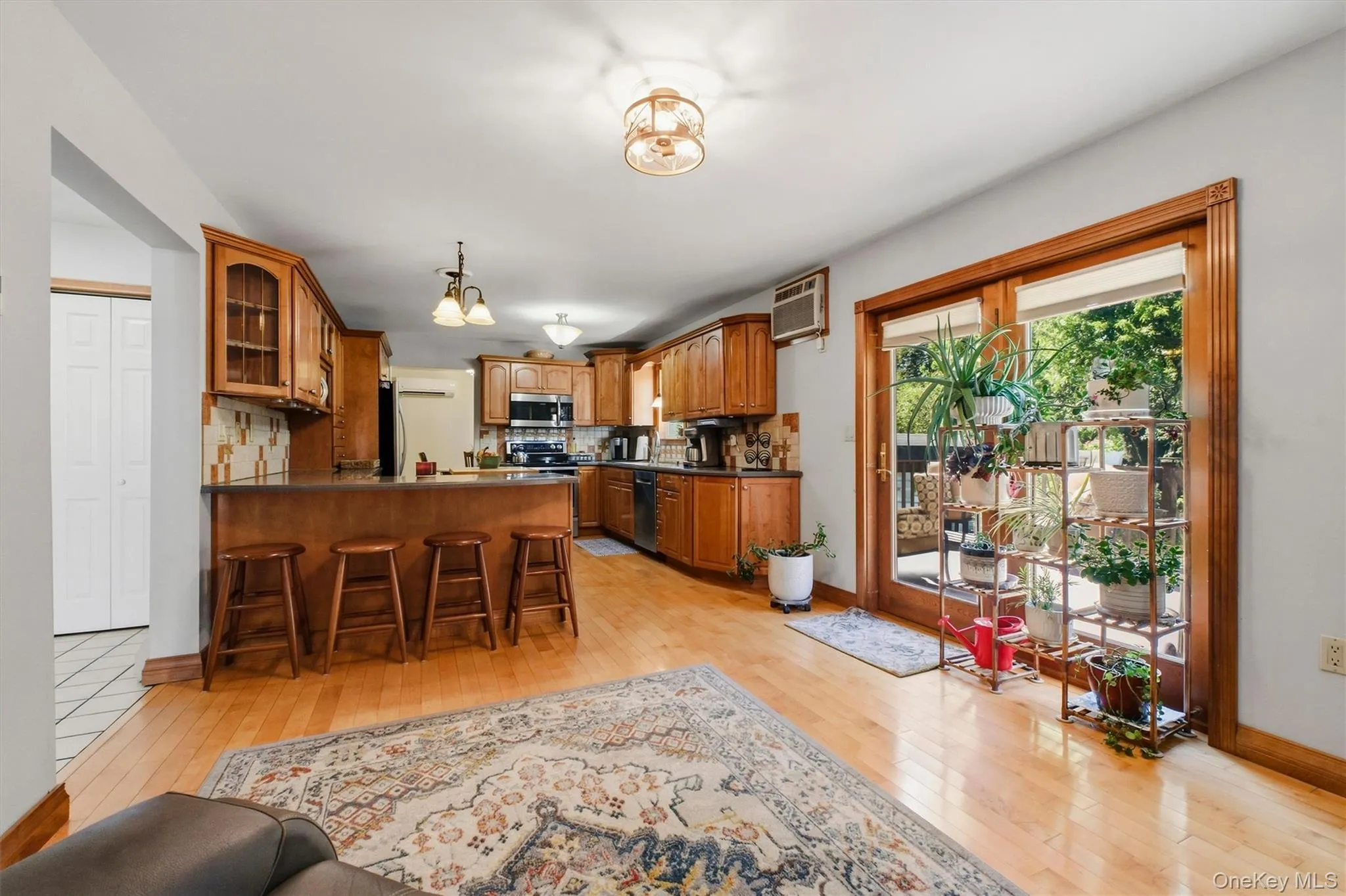 Family Room to Deck. Open Floor Plan to Kitchen Family Room to Deck. Open Floor Plan to Kitchen