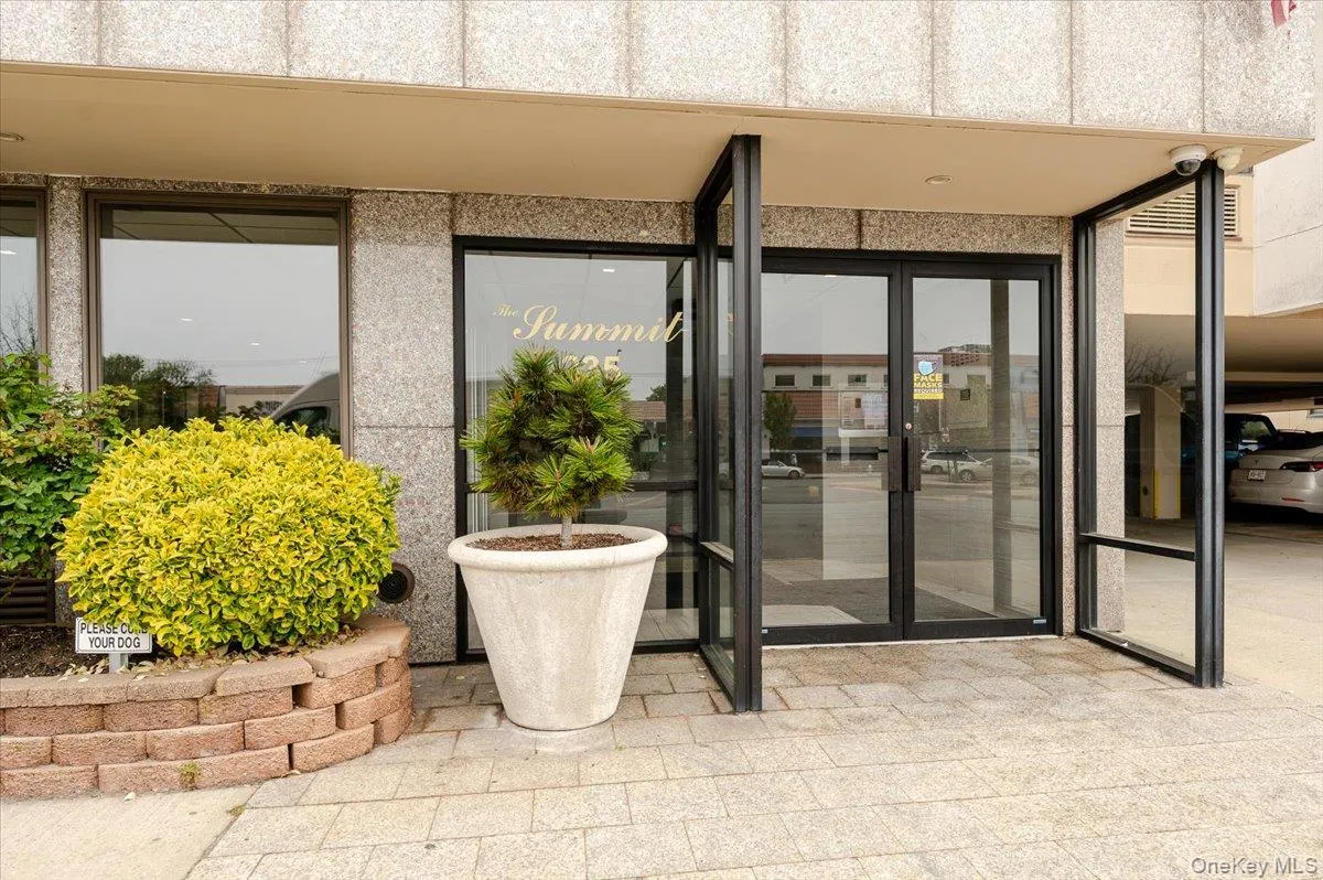 Doorway to property featuring french doors Doorway to property featuring french doors