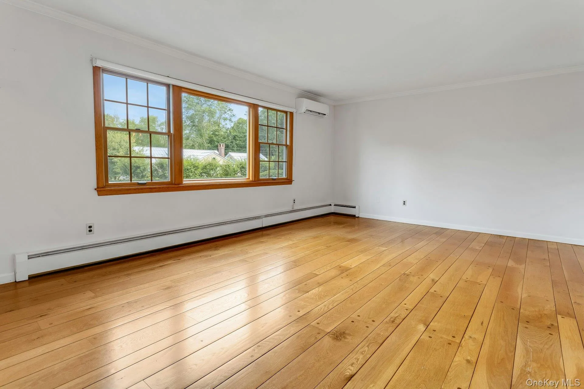 Living Room with hardwood pegged flooring. Living Room with hardwood pegged flooring.