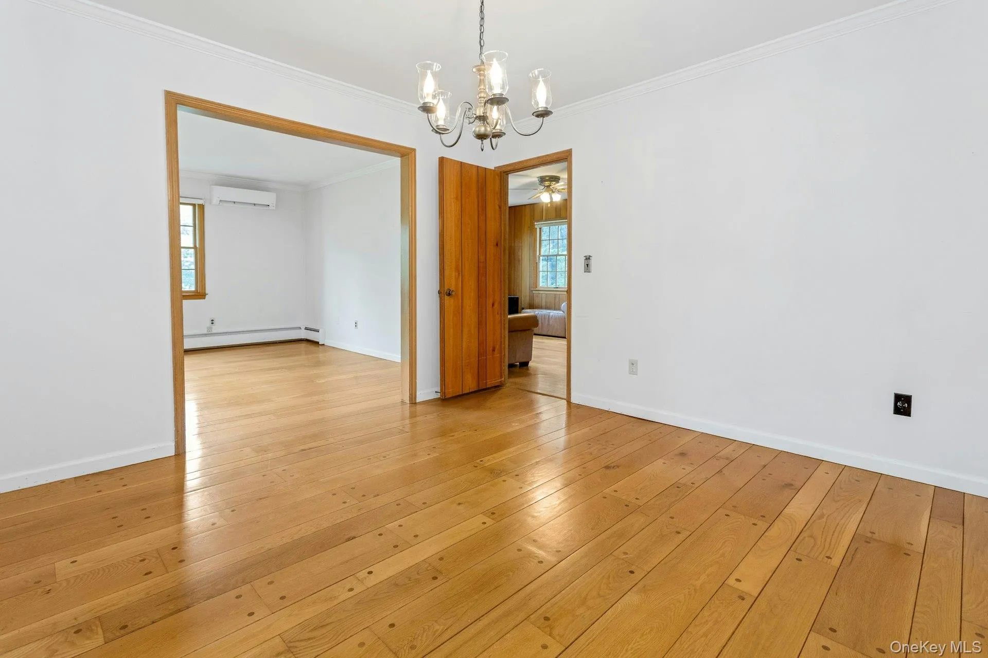 Dining Room opens to Living Room and Family Room. Dining Room opens to Living Room and Family Room.