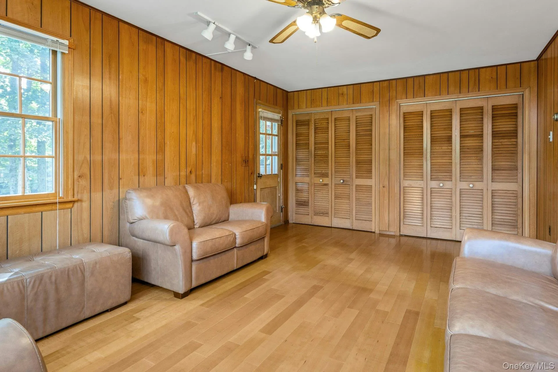Family room with large coat closet and laundry (behind closet doors) on main level. Family room with large coat closet and laundry (behind closet doors) on main level.