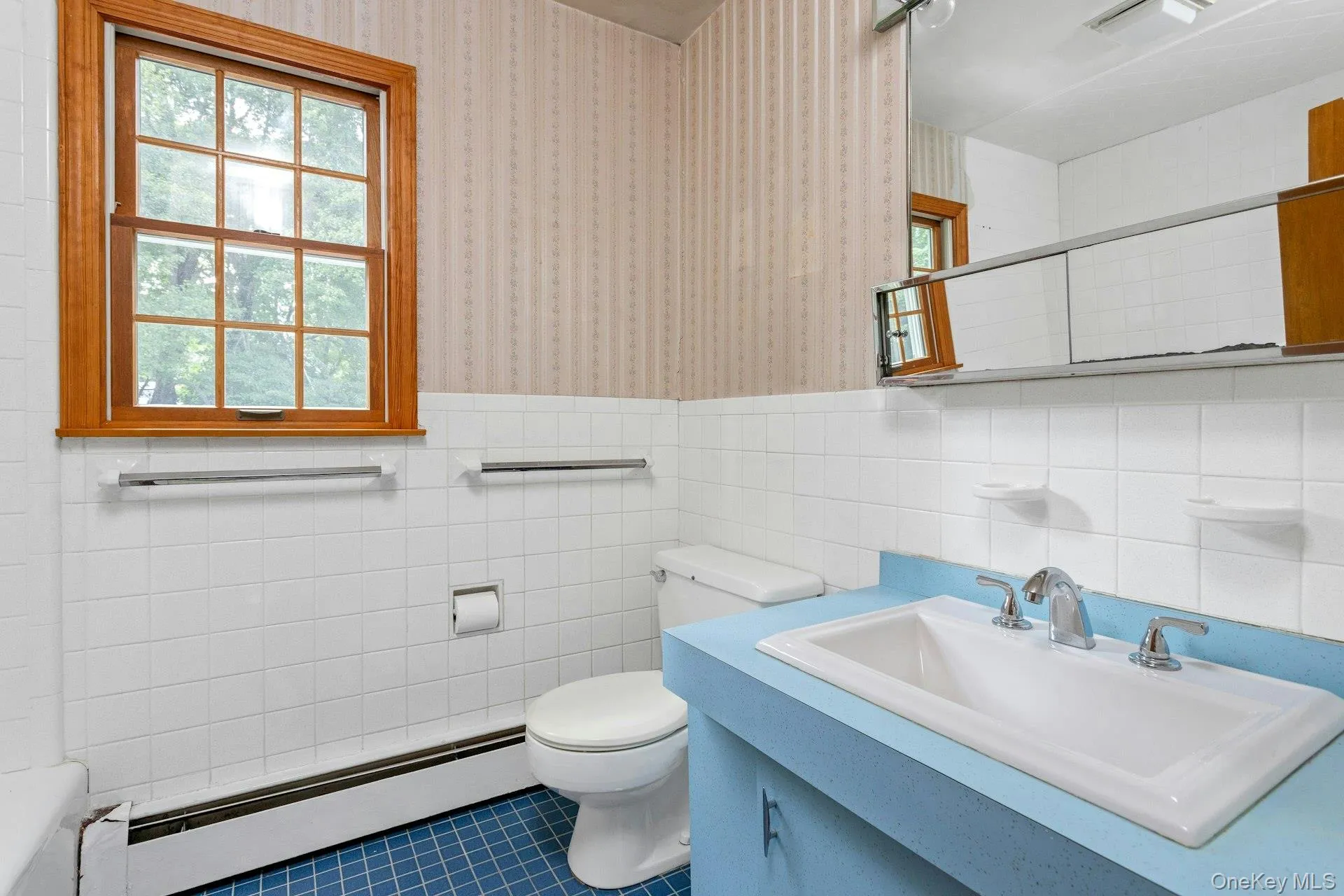 Second floor hall bathroom. Second floor hall bathroom.