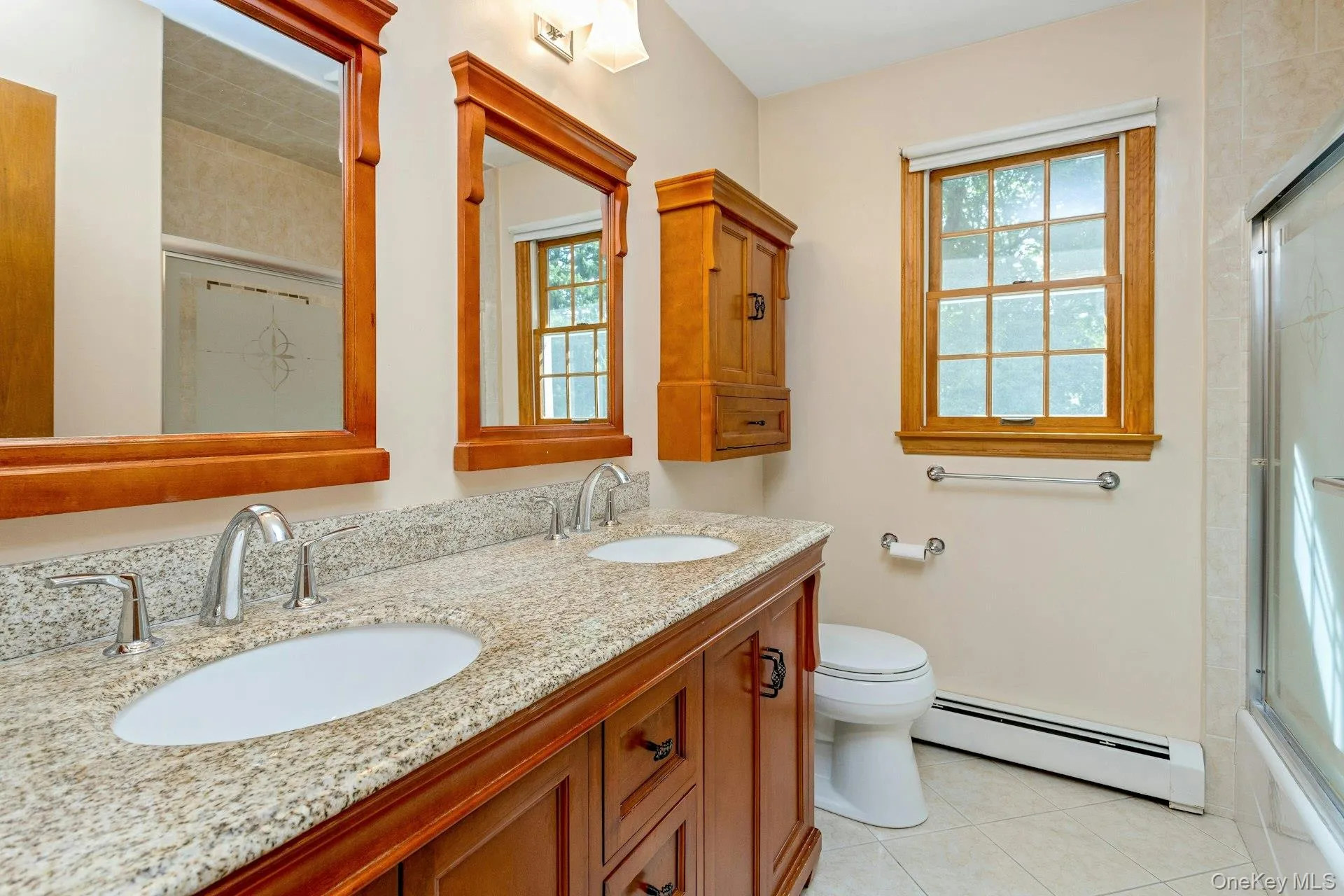 Updated Hall Bath with double-sink vanity. Updated Hall Bath with double-sink vanity.