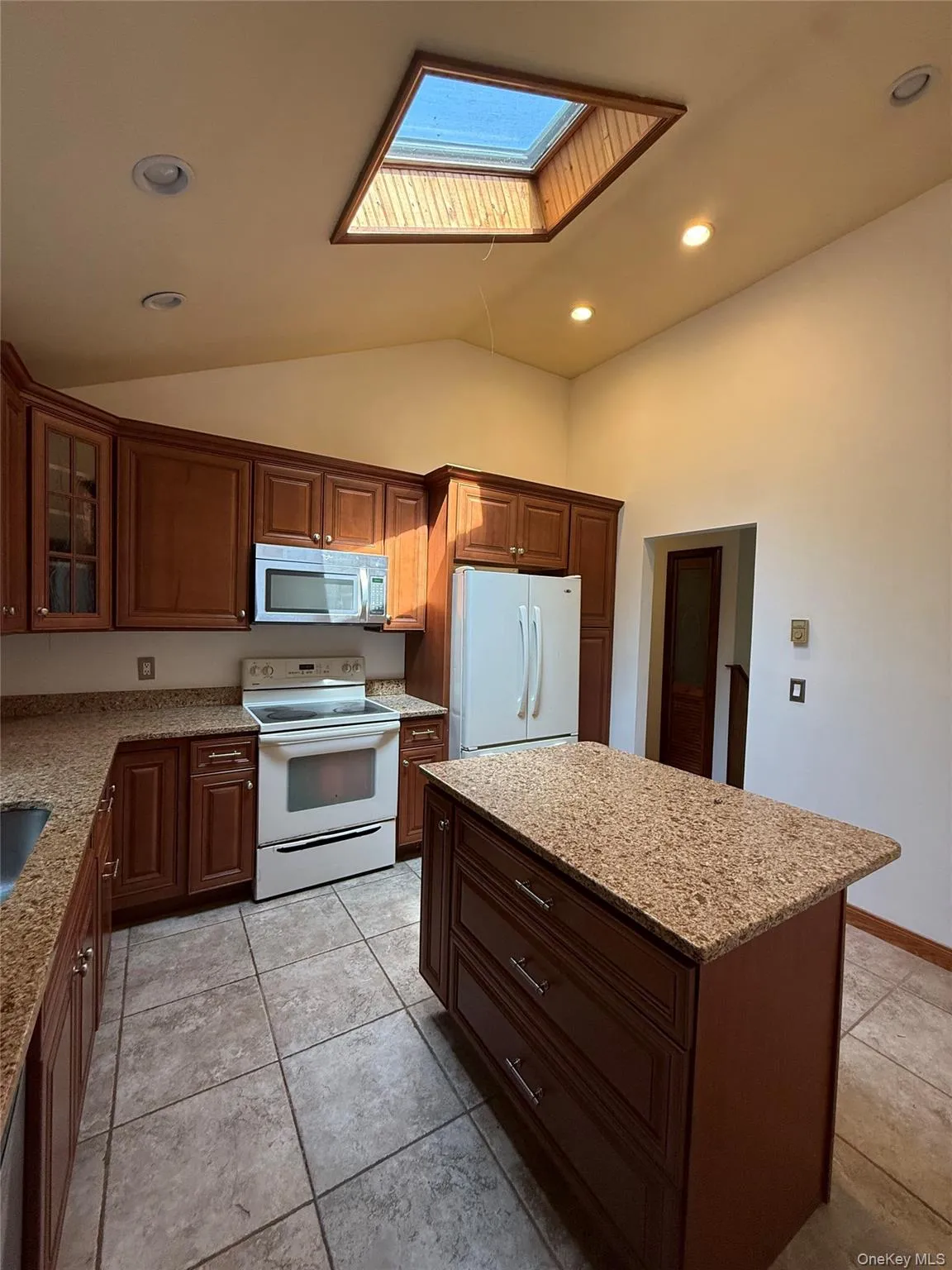 Kitchen - stove was recently replaced to a newer style Kitchen - stove was recently replaced to a newer style