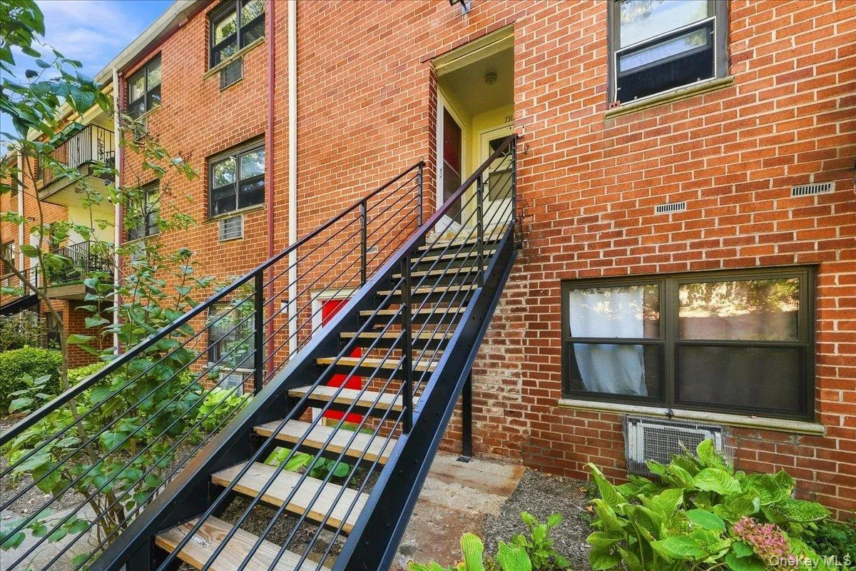 Stairs leading to the unit Stairs leading to the unit
