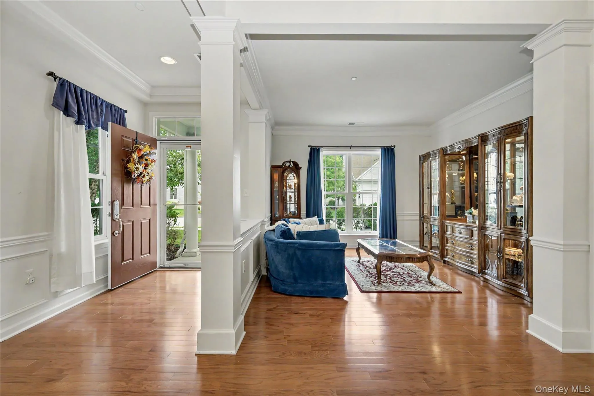 Hardwood-finish flooring, white trim details, recessed lighting Hardwood-finish flooring, white trim details, recessed lighting