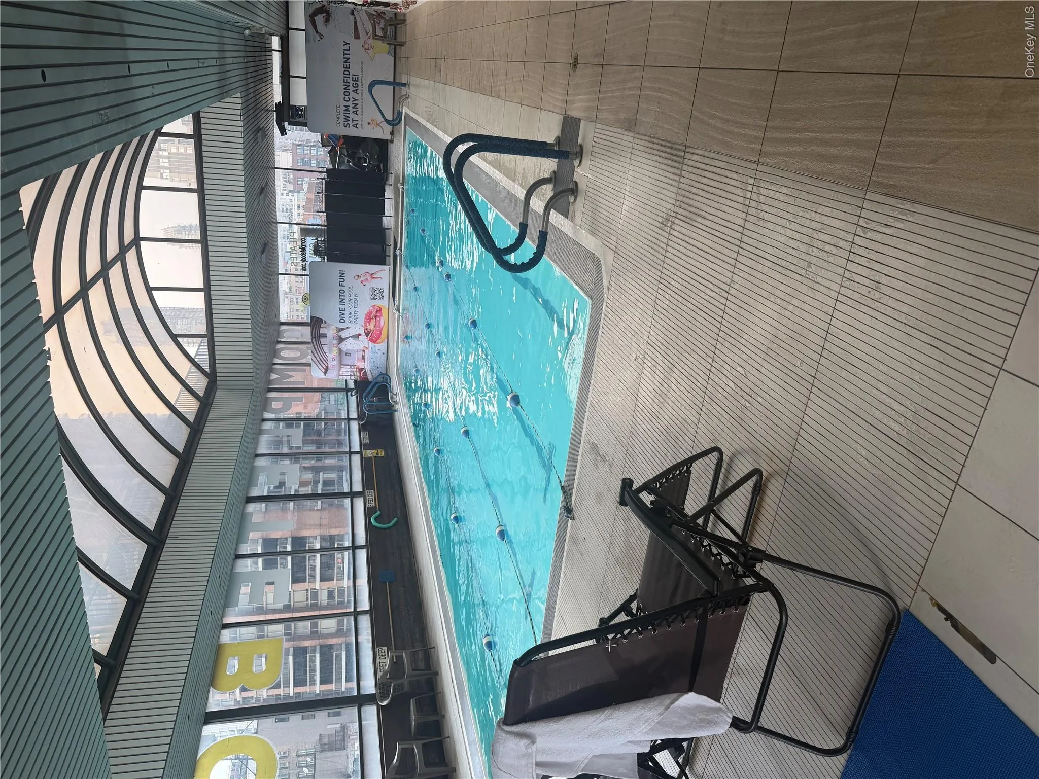 Indoor swimming pool with a curved translucent ceiling Indoor swimming pool with a curved translucent ceiling