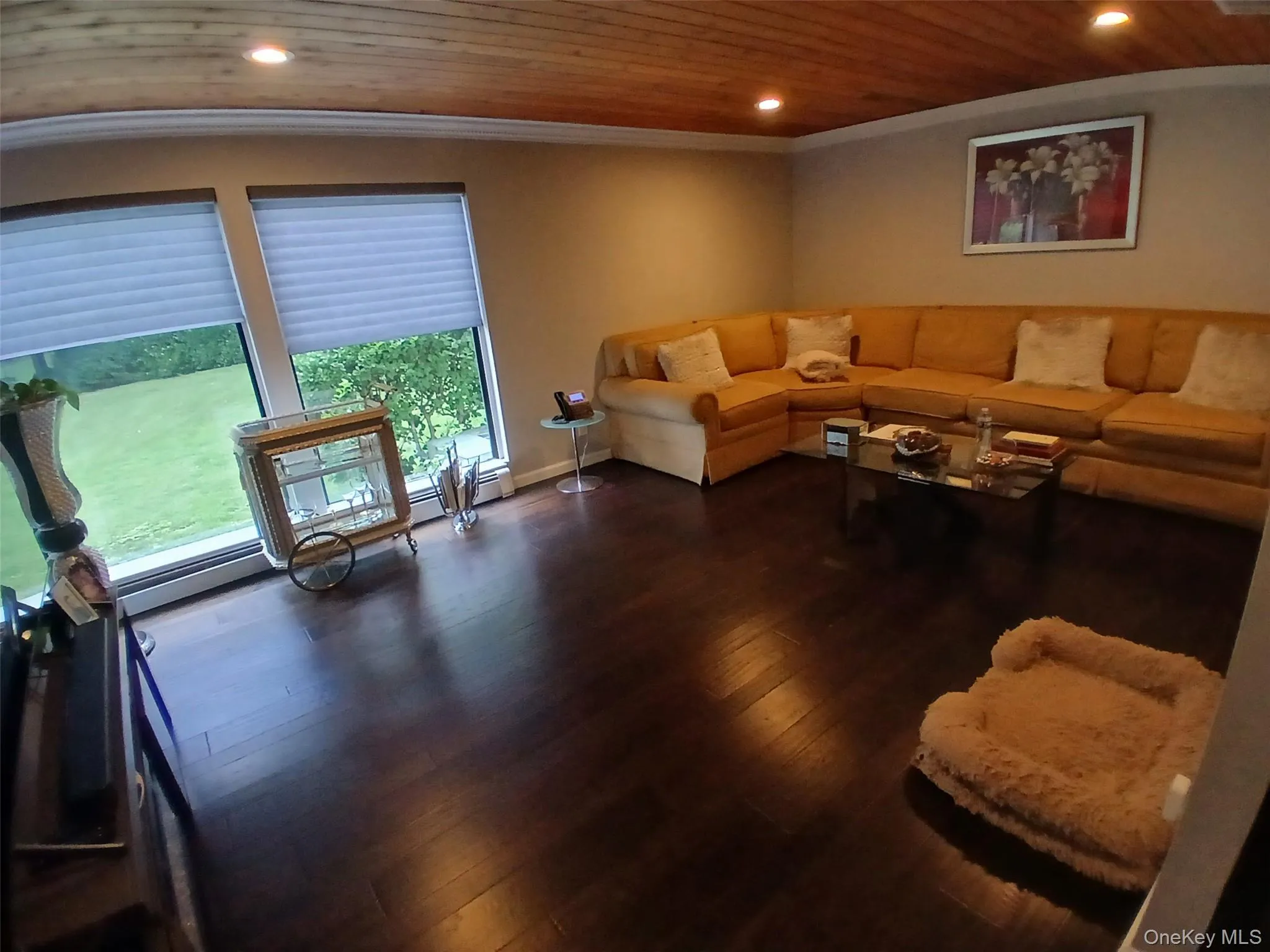 Recessed lighting, wood-finish flooring, and a wood plank ceiling Recessed lighting, wood-finish flooring, and a wood plank ceiling