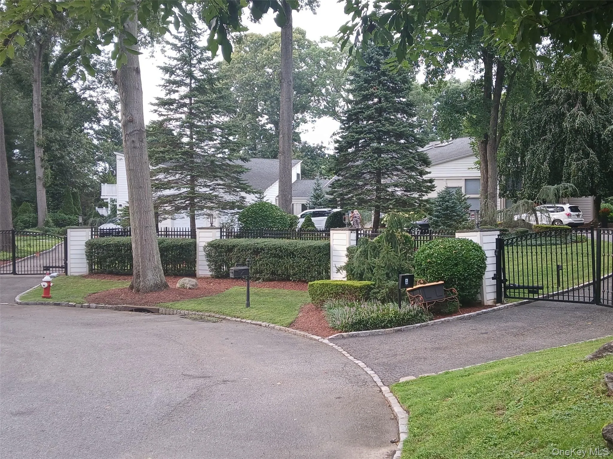 Cul-de-Sac Entry to Gated Circular Drive for 10+ Vehicles. Cul-de-Sac Entry to Gated Circular Drive for 10+ Vehicles.