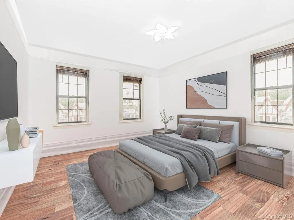 Bedroom featuring light hardwood / wood-style flooring Bedroom featuring light hardwood / wood-style flooring