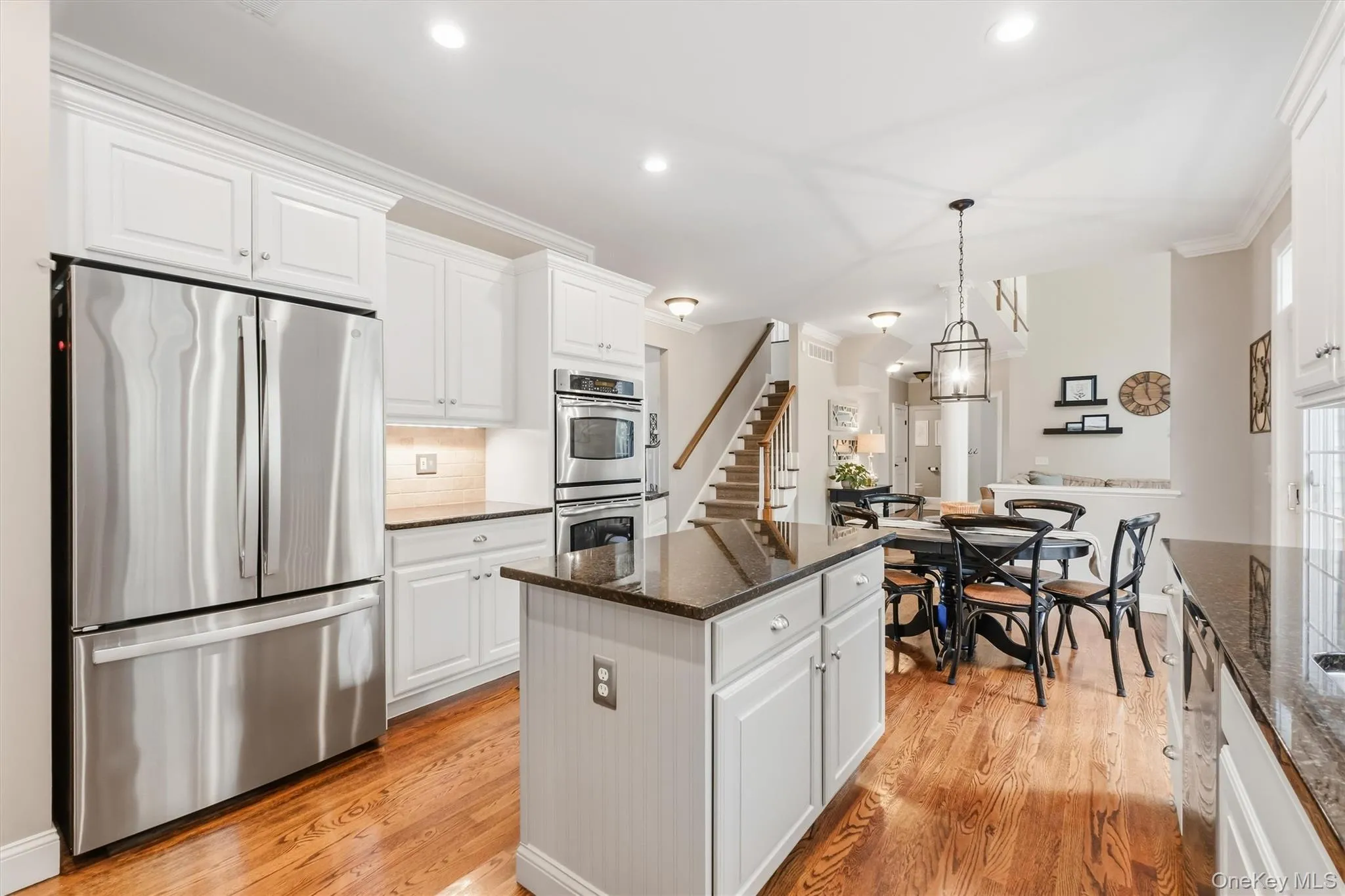 The unique layout offers seamless flow and ample storage, making this kitchen as practical as it is beautiful. Whether you're an avid cook or a host who loves to entertain, this exceptional kitchen delivers luxury and convenience at every turn. This kitchen is the heart of this home and the perfect entertaining layout! The unique layout offers seamless flow and ample storage, making this kitchen as practical as it is beautiful. Whether you're an avid cook or a host who loves to entertain, this exceptional kitchen delivers luxury and convenience at every turn. This kitchen is the heart of this home and the perfect entertaining layout!
