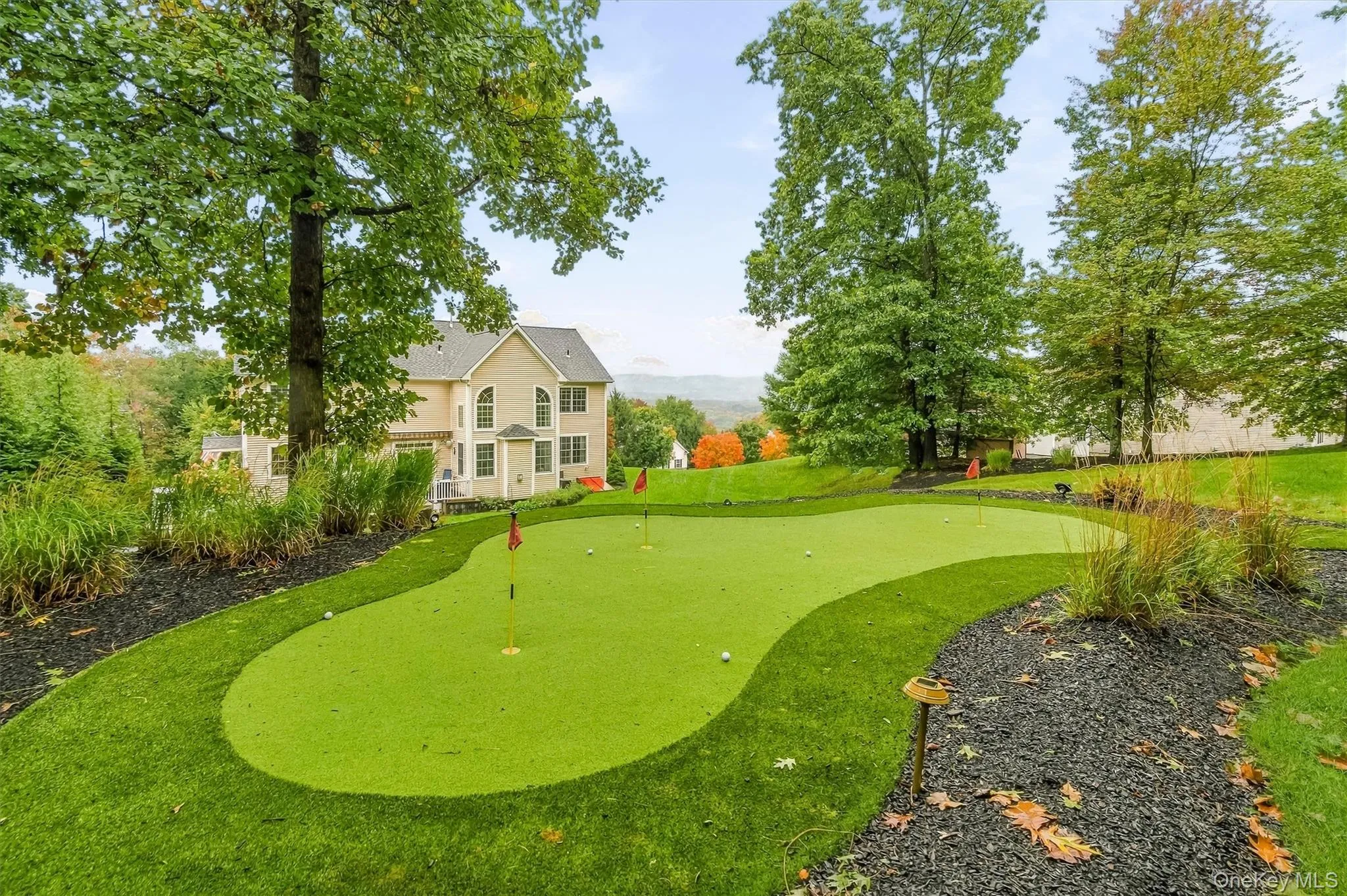Tier 2 Yard Putting Green:A private putting green adds a playful resort-style touch, while the versatile layout provides the perfect backdrop for practicing your short game by day and toasting marshmallows under the stars at night—all with minimal upkeep and exceptional privacy. Tier 2 Yard Putting Green:A private putting green adds a playful resort-style touch, while the versatile layout provides the perfect backdrop for practicing your short game by day and toasting marshmallows under the stars at night—all with minimal upkeep and exceptional privacy.