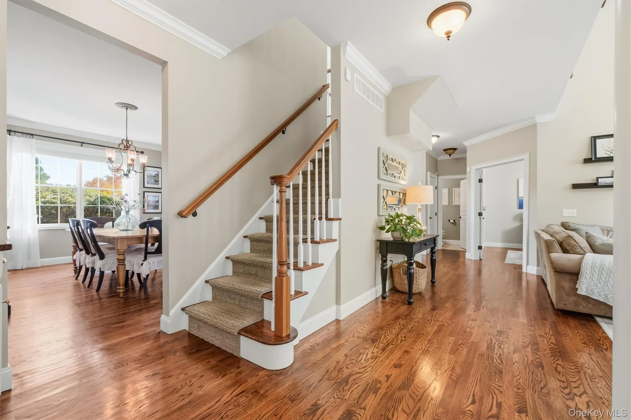 Thoughtfully designed, this elevated passage enhances the home’s airy, open flow while seamlessly linking to the second-floor living spaces. Thoughtfully designed, this elevated passage enhances the home’s airy, open flow while seamlessly linking to the second-floor living spaces.