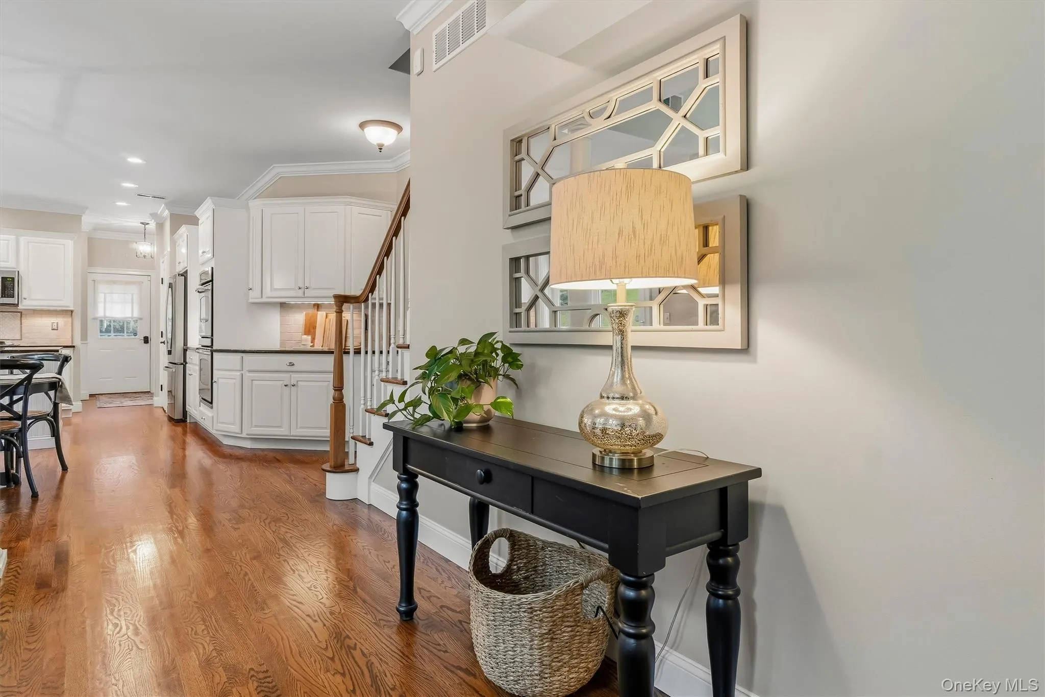 With an open layout that flows effortlessly to the kitchen and eat-in area, finished with hardwood floors and elegant details, this space is an entertainer’s dream both stylish and functional. With an open layout that flows effortlessly to the kitchen and eat-in area, finished with hardwood floors and elegant details, this space is an entertainer’s dream both stylish and functional.