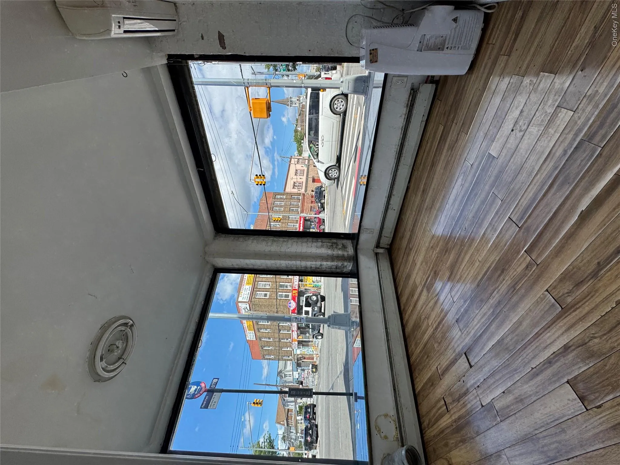 Corner street view from interior. Corner street view from interior.