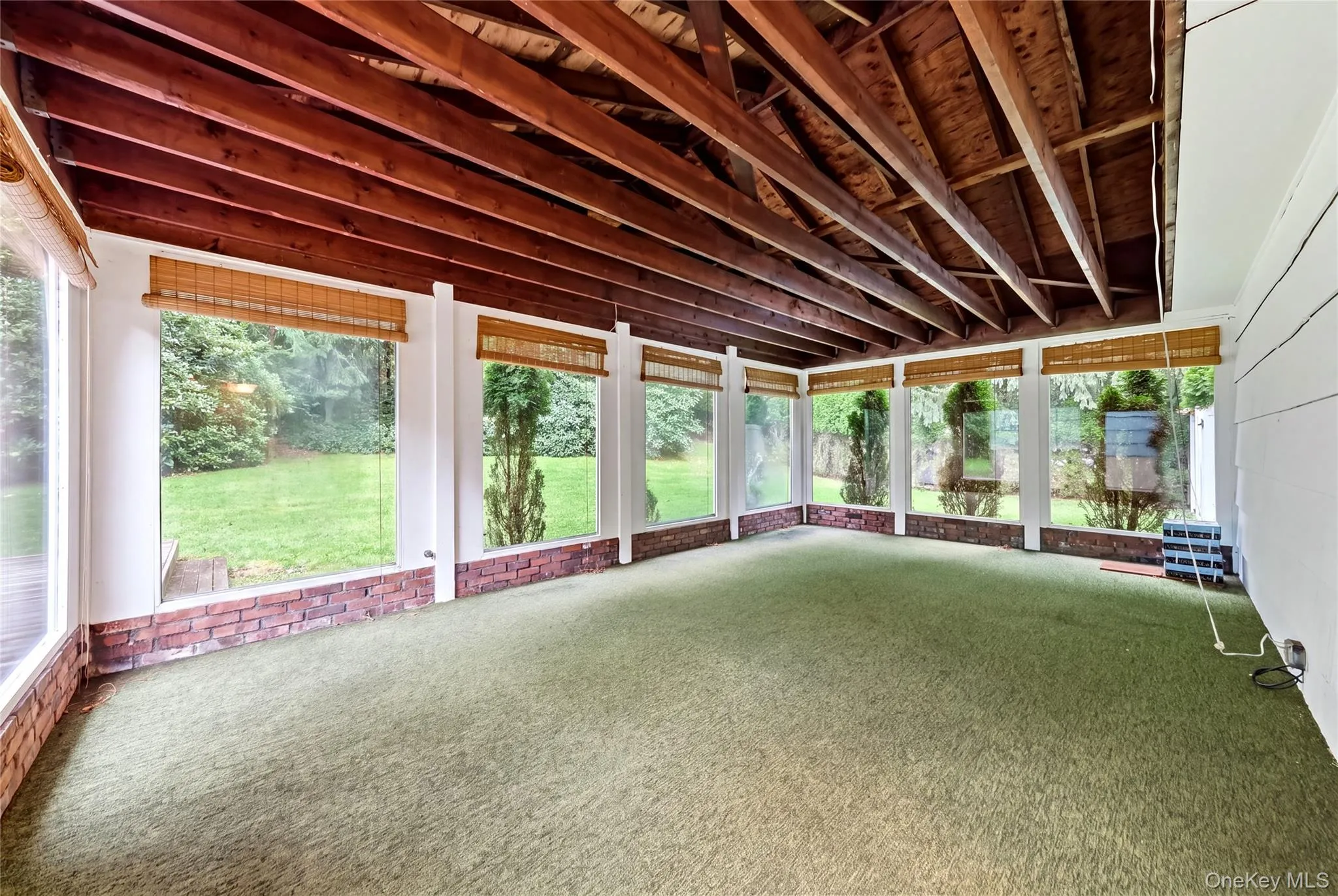 Florida room off of kitchen with vaulted ceiling Florida room off of kitchen with vaulted ceiling