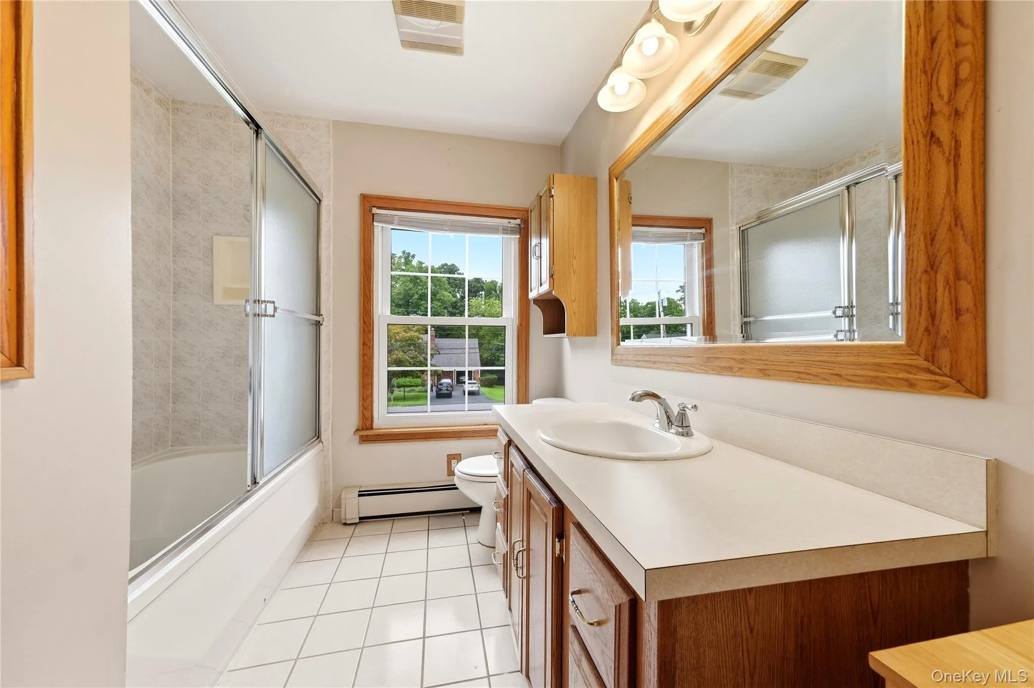 Full bathroom with shower/ tub combo Full bathroom with shower/ tub combo