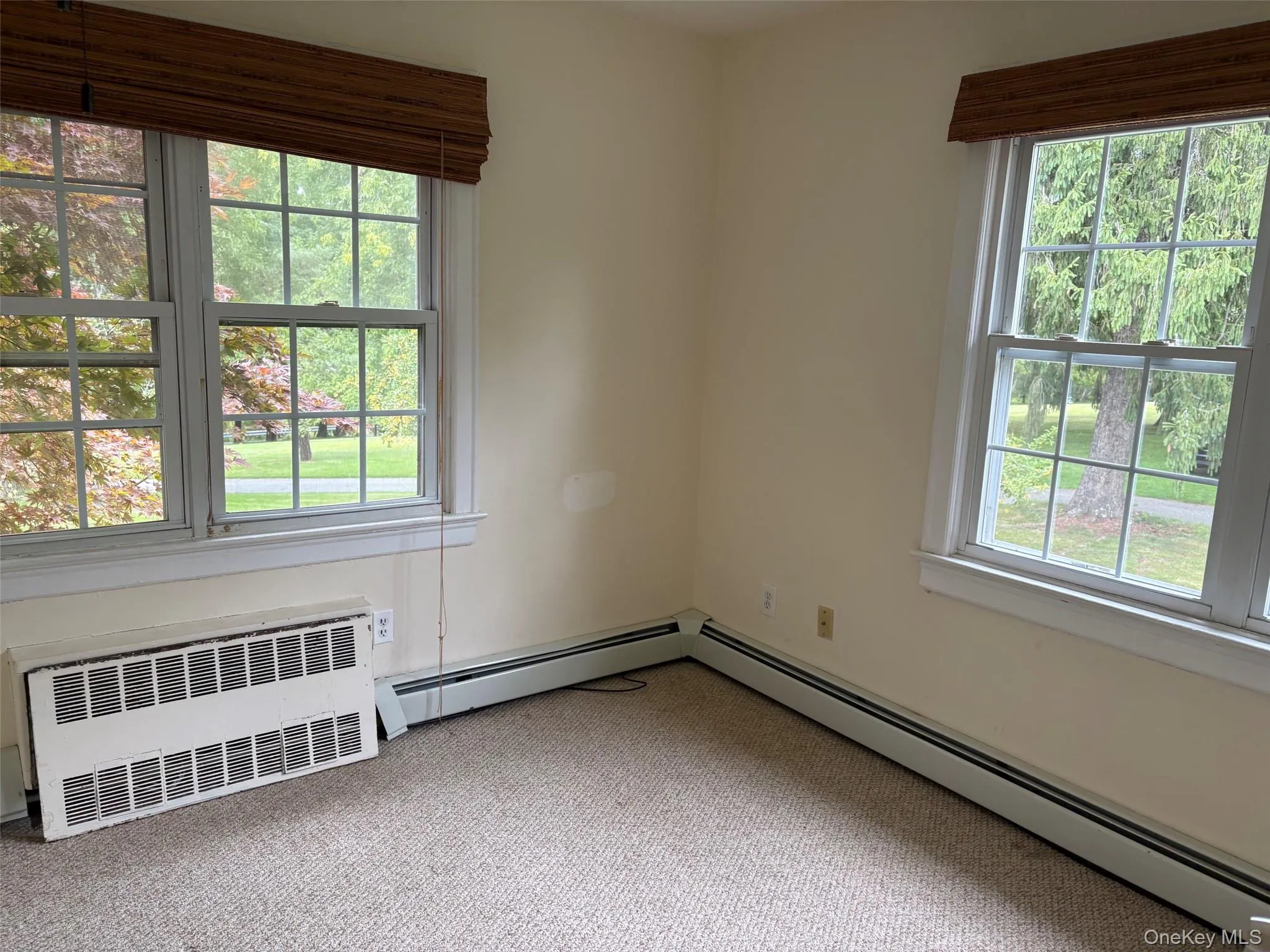 second bedroom with 3 windows and full closet second bedroom with 3 windows and full closet