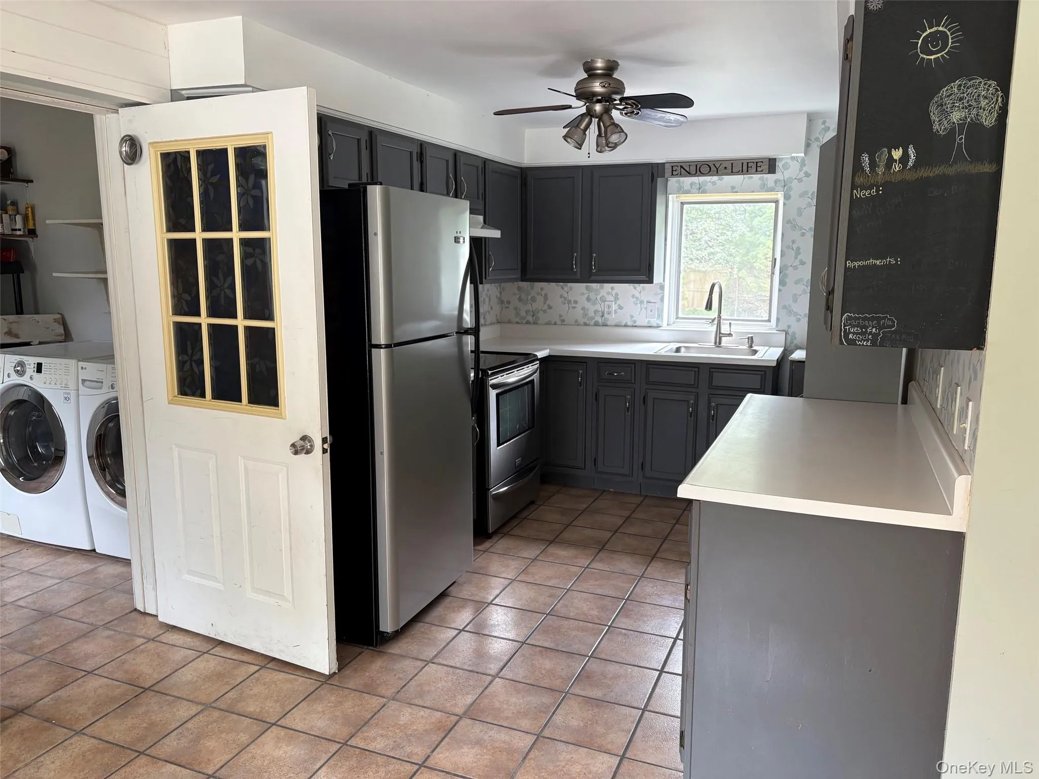 kitchen with washer dryer mudroom near kitchen and home second entry off driveway kitchen with washer dryer mudroom near kitchen and home second entry off driveway