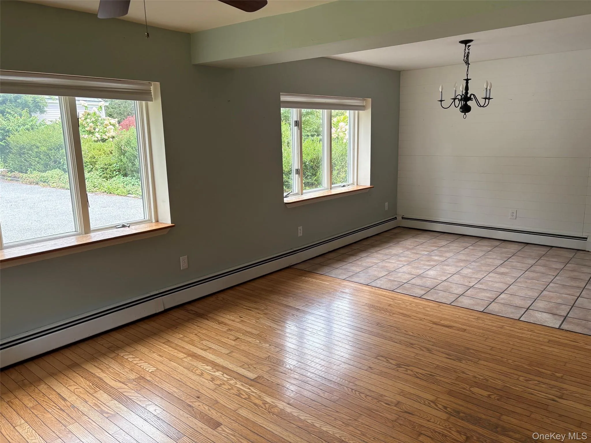 view of living room andd dining room Tile floor in dining room and kitchen view of living room andd dining room Tile floor in dining room and kitchen