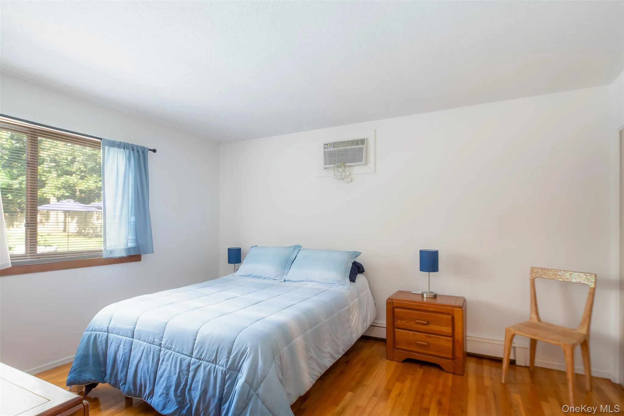 Bedroom #1 Hardwood floors/ Large closet with cedar Bedroom #1 Hardwood floors/ Large closet with cedar