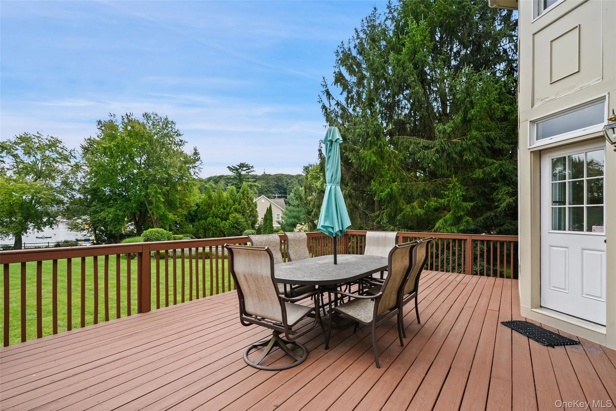 Large entertainment deck with lake views Large entertainment deck with lake views