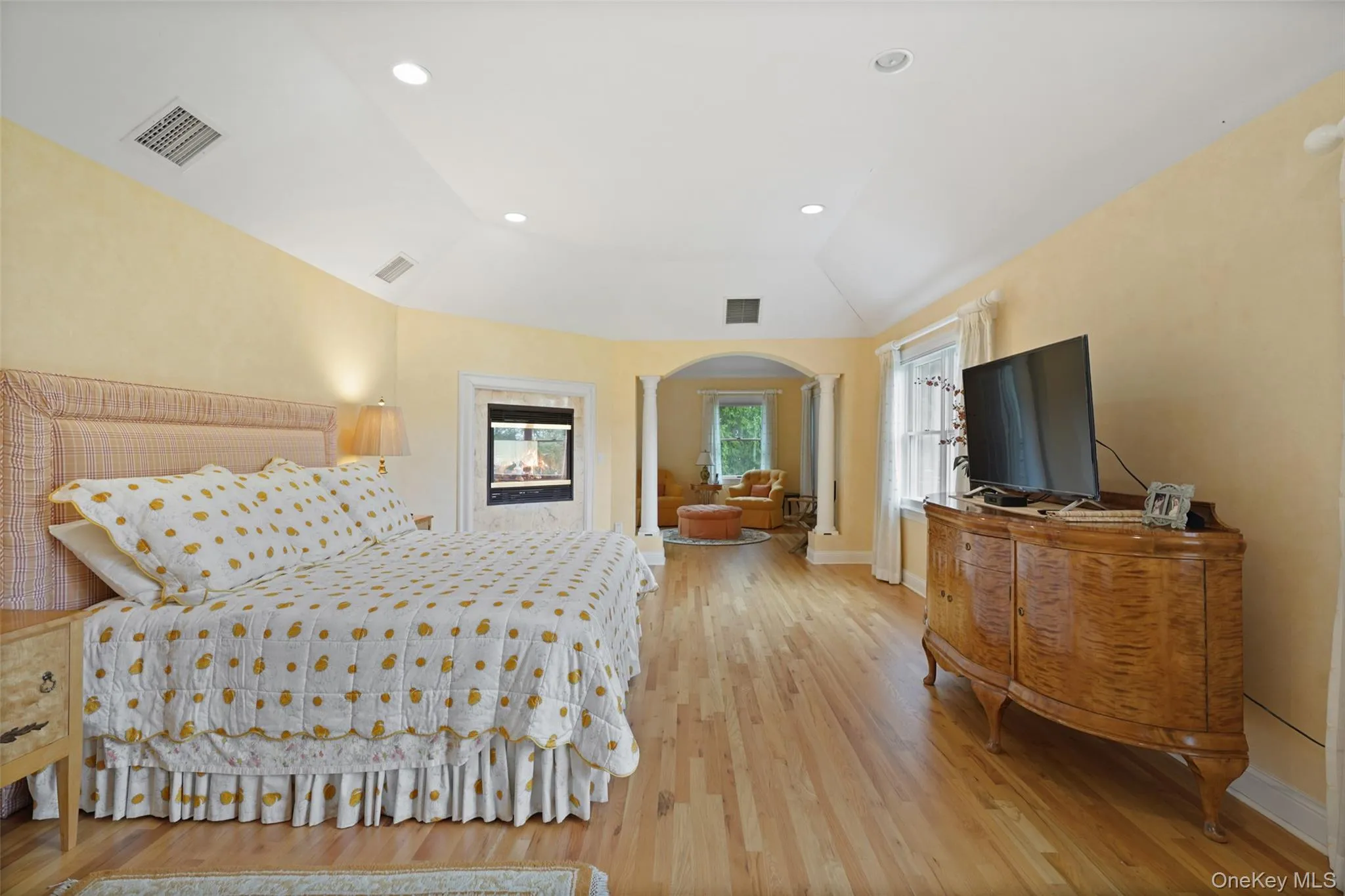 Luxurious 40' Primary Bedroom with gas fireplace, sitting room and primary bathroom Luxurious 40' Primary Bedroom with gas fireplace, sitting room and primary bathroom
